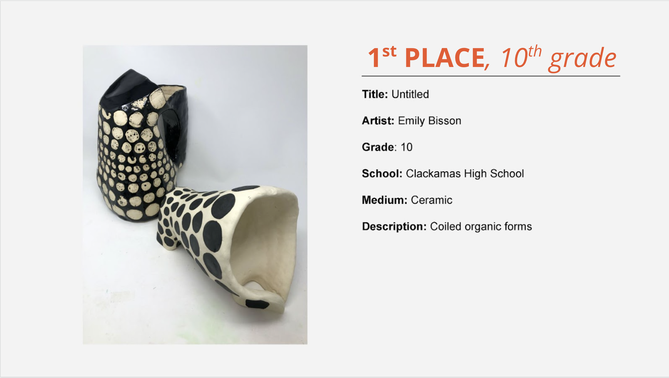 1st place, 10th grade: black and white polka-dotted pitchers with handles. Title: Untitled Artist: Emily Bisson Grade: 10 School: Clackamas High School Medium: Ceramic Description: Coiled organic forms